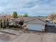 Single story home with a large driveway and landscaping at 520 Belville Rd, Pahrump, NV 89048