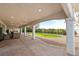 Covered patio with seating area and views of the backyard at 520 Belville Rd, Pahrump, NV 89048