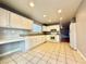 Efficient kitchen with white cabinets and granite countertops at 5549 Jacobs Field St, Las Vegas, NV 89148