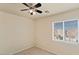 Bedroom with ceiling fan and window blinds at 6122 Walker Valley Ct, Las Vegas, NV 89139