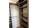 Spacious closet with built-in shelving and hanging rods at 6529 Bourbon Way, Las Vegas, NV 89107