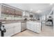 Updated kitchen featuring stainless steel appliances and white cabinets at 7009 Rawlins Ct, Las Vegas, NV 89128