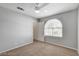 Spacious bedroom with neutral walls and a ceiling fan at 8863 Chapman Point, Las Vegas, NV 89129