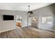 Hardwood floor bedroom with views into the bathroom and kitchen at 1009 Pueblo Hills Ave, North Las Vegas, NV 89032