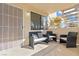 Private patio with comfortable seating area at 1009 Sulphur Springs Ln # 101, Las Vegas, NV 89128