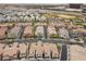 Aerial view of a large residential community with a focus on a section of townhomes at 11347 Belmont Lake Dr # 101, Las Vegas, NV 89135