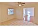 Dining area with tile floors and adjacent living room at 184 Fallon Dr, Henderson, NV 89074