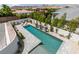 Luxury pool with spacious patio and landscape at 3423 Spanish Winds Ct, Las Vegas, NV 89141