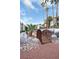 Landscaped walkway with a wooden footbridge and palm trees at 3550 Bay Sands Dr # 3064, Laughlin, NV 89029