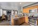 Kitchen with stainless steel appliances and view into living room at 4127 Neighborly Ct, North Las Vegas, NV 89032