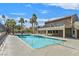 Sparkling community pool with a nearby clubhouse at 5021 River Glen Dr # 47, Las Vegas, NV 89103