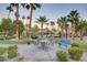 Community patio with seating and landscaping at 5301 River Glen Dr # 210, Las Vegas, NV 89103