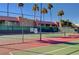 Well-maintained tennis court with surrounding fence at 5301 River Glen Dr # 210, Las Vegas, NV 89103