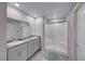 Modern bathroom with double vanity and large shower at 545 Carmel Point Ct, Henderson, NV 89044