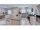 Modern kitchen featuring stainless steel appliances and granite countertops at 545 Carmel Point Ct, Henderson, NV 89044