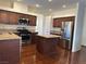 Kitchen with island, stainless steel appliances, and granite countertops at 3640 Gerri Bay Ln, Las Vegas, NV 89147