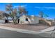 Newly renovated home with a spacious yard and rock landscaping at 6252 Fairwood Ave, Las Vegas, NV 89107