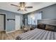 Bedroom with queen bed, dresser, and ceiling fan at 4362 Adelphi Ave, Las Vegas, NV 89120