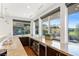 Modern wet bar with granite countertops and a view at 587 Saint Croix St, Henderson, NV 89012