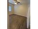 Spacious bedroom with ceiling fan and wood-look floors at 1050 E Cactus Ave # 2110, Las Vegas, NV 89183