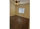 Spacious bedroom featuring laminate flooring and a ceiling fan at 1050 E Cactus Ave # 2110, Las Vegas, NV 89183