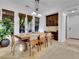 Spacious dining area with wooden table and built-in cabinetry at 12056 Royal Dolnoch Ct, Las Vegas, NV 89141