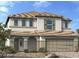 Two-story house with beige siding, brown roof, and attached garage at 3039 Magnolia Ranch Ave, Las Vegas, NV 89139