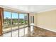 Bright living room with marble floors and sliding doors leading to a balcony with city views at 322 Karen Ave # 903, Las Vegas, NV 89109