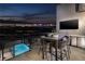 Outdoor patio with city views, pool, and built-in grill at 500 Overlook Rim Dr, Henderson, NV 89012