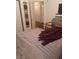 Bedroom with metal bed frame and access to additional rooms at 5412 Harmony Green Dr # 201, Las Vegas, NV 89149