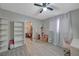 Bright bedroom featuring built-in shelving and a workspace at 614 Hidden Valley Dr, Henderson, NV 89002