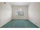 Formal dining room featuring large window with plantation shutters at 6460 Spanish Garden Ct, Las Vegas, NV 89110