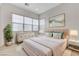 Spacious bedroom with large window and stylish decor at 9002 Shifting Skye St, Las Vegas, NV 89166