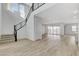 Bright and spacious entryway with modern staircase and wood floors at 9002 Shifting Skye St, Las Vegas, NV 89166