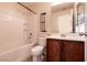 Full bathroom with tub, shower, and vanity at 9032 Mackanos Ave, Las Vegas, NV 89148