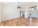 Elegant dining room with hardwood floors and a crystal chandelier at 9621 Blue Bell Dr, Las Vegas, NV 89134