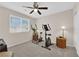 Well-lit exercise room with elliptical and stationary bike at 9665 Powell River Dr, Las Vegas, NV 89148