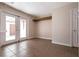 Dining room with tile floors and access to the patio at 136 Greenbriar Townhouse Way, Las Vegas, NV 89121