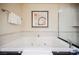 Bathroom with soaking tub and separate shower at 145 Harmon Ave # 208, Las Vegas, NV 89109