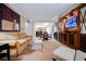 Open living room showcasing a stylish sofa and entertainment center at 145 Harmon Ave # 208, Las Vegas, NV 89109