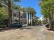 Upscale community streetscape with palm trees and luxury retail at 2110 Mooreview St, Henderson, NV 89012