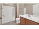 Clean bathroom with tub shower, vanity, and tile floors at 2305 W Horizon Ridge Pkwy # 2712, Henderson, NV 89052