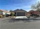 One-story house with gray exterior and a two-car garage at 2420 Ailsa Craig St, Henderson, NV 89044