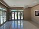 Gathering room with sliding glass doors to the pool at 3045 Lindell Rd, Las Vegas, NV 89146