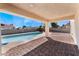 Brick paved patio area overlooking refreshing pool at 3920 Syracuse Dr, Las Vegas, NV 89121