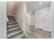 Gray carpeted staircase leading to the second floor at 3920 Syracuse Dr, Las Vegas, NV 89121