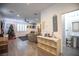 Living room with gray sofa, Christmas tree, and access to a half bathroom at 434 Fortissimo St, Henderson, NV 89011