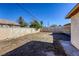 Large backyard with block wall and gravel at 4880 Welter Ave, Las Vegas, NV 89104