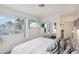 Bedroom with mounted TV and mirrored closet at 5007 Spencer St # A, Las Vegas, NV 89119