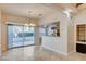 Dining area with sliding doors to backyard access at 7844 Bluewater Dr, Las Vegas, NV 89128